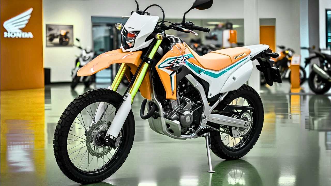 Honda CRF300L Swift Gray with Orange Decals – Lightweight Dual Sport Motorcycle for Adventure and Off-Road Riding